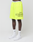 A person wearing neon yellow LFDY Guaranteed Mesh Shorts by LIVE FAST DIE YOUNG, white socks with LFDT text, and white Nike sneakers stands against a plain light background. Only the lower body is shown.