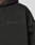 Close-up of the Basic 360 Hooded by LIVE FAST DIE YOUNG: an oversize fit black cotton sweatshirt with subtle "LiveFast" front print and additional print details on front and back. Soft, slightly textured fabric.