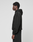 A person in profile wears the LIVE FAST DIE YOUNG Basic 360 Hooded in black and matching black pants against a plain light gray background. The hoodie features a subtle front and back print.