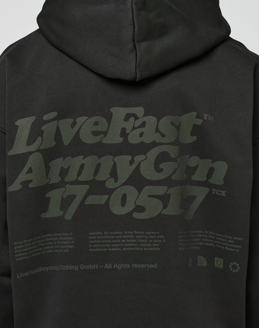 The Basic 360 Hooded by LIVE FAST DIE YOUNG is an oversized black hoodie with green “LiveFast Army Grn 17–0517” text, front and back prints, care symbols, and branding. Made from premium cotton.