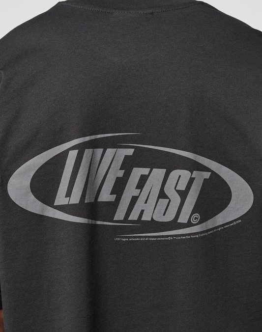 The LFDY Sphere Tee by LIVE FAST DIE YOUNG is a black oversized cotton T-shirt with striking front and back prints, including a large oval graphic and bold light gray LIVE FAST text on the back.