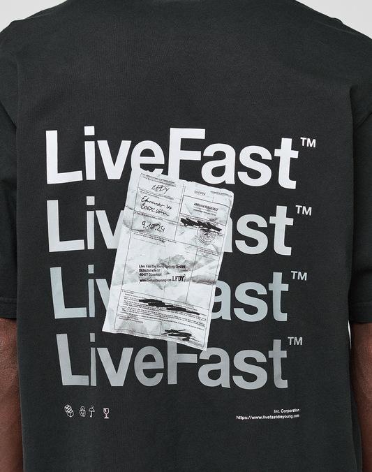 Back of the black Basic Evidence Tee by LIVE FAST DIE YOUNG with "LiveFast" four times in bold white, a crumpled receipt image over the text, small symbols, 100% Baumwolle, front/back print, and website link at the bottom.