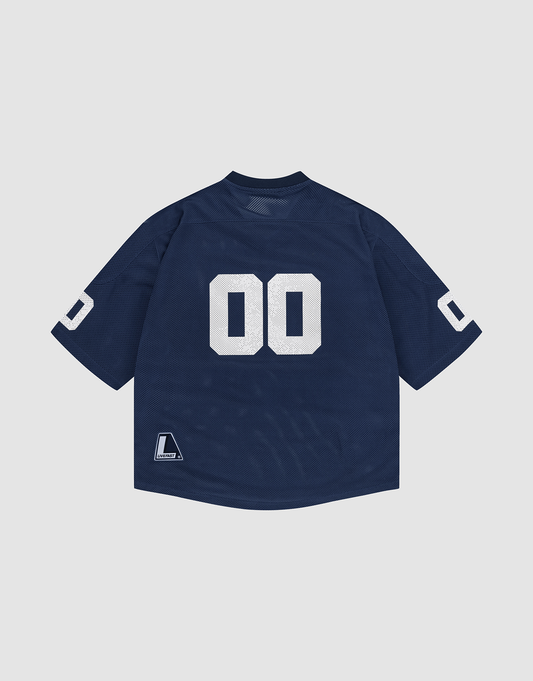 The LFDY Mesh Jersey by LIVE FAST DIE YOUNG features a navy blue design with a V-neck, oversized fit, white "00" on the back and sleeves, short sleeves, soft polyester fabric, a small hem label, and a plain light gray background.