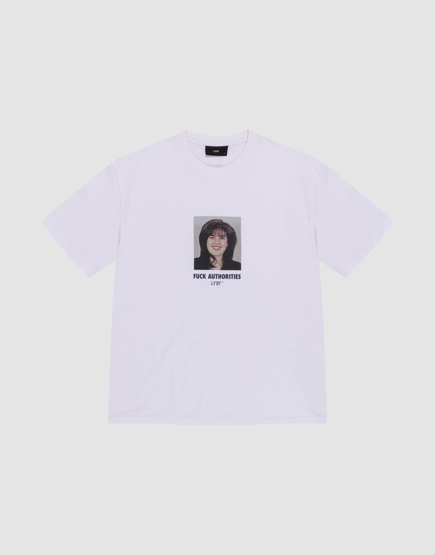 The LFDY Authorities Tee by LIVE FAST DIE YOUNG is a white regular fit shirt made from 100% Baumwolle, featuring a bold front print of a person showing their middle finger with "FUCK AUTHORITIES ART" in black text below. | plain