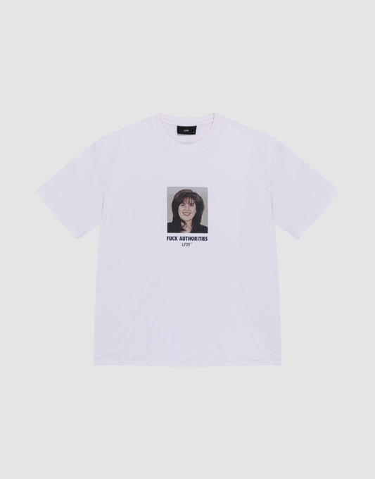 The LFDY Authorities Tee by LIVE FAST DIE YOUNG is a white regular fit shirt made from 100% Baumwolle, featuring a bold front print of a person showing their middle finger with "FUCK AUTHORITIES ART" in black text below.