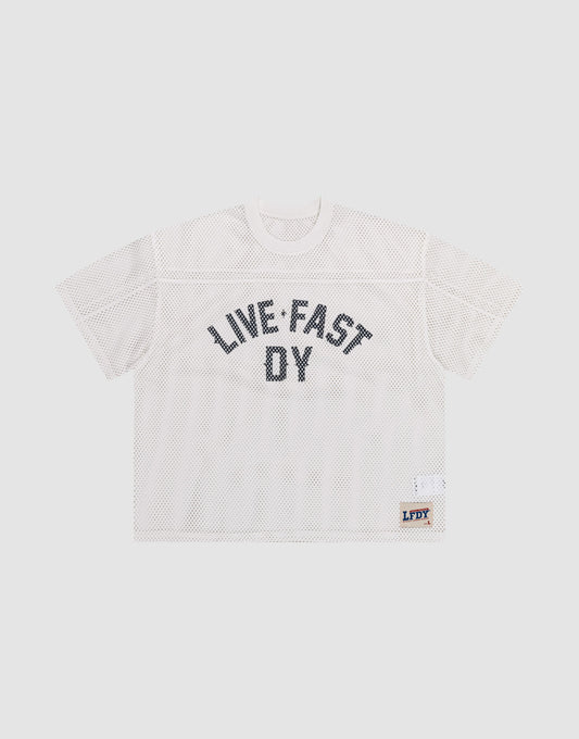 The LFDY Boxy Jersey by LIVE FAST DIE YOUNG features a white mesh, boxy fit, short sleeves, bold black "LIVE FAST DY" lettering on the front, and a small LFDY patch near the hem. Made from 100% polyester for comfort and durability. | plain
