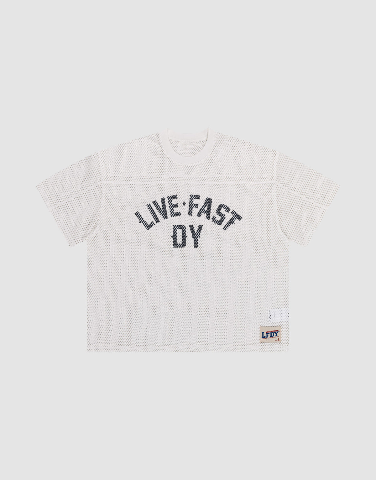 The LFDY Boxy Jersey by LIVE FAST DIE YOUNG features a white mesh, boxy fit, short sleeves, bold black "LIVE FAST DY" lettering on the front, and a small LFDY patch near the hem. Made from 100% polyester for comfort and durability. | plain
