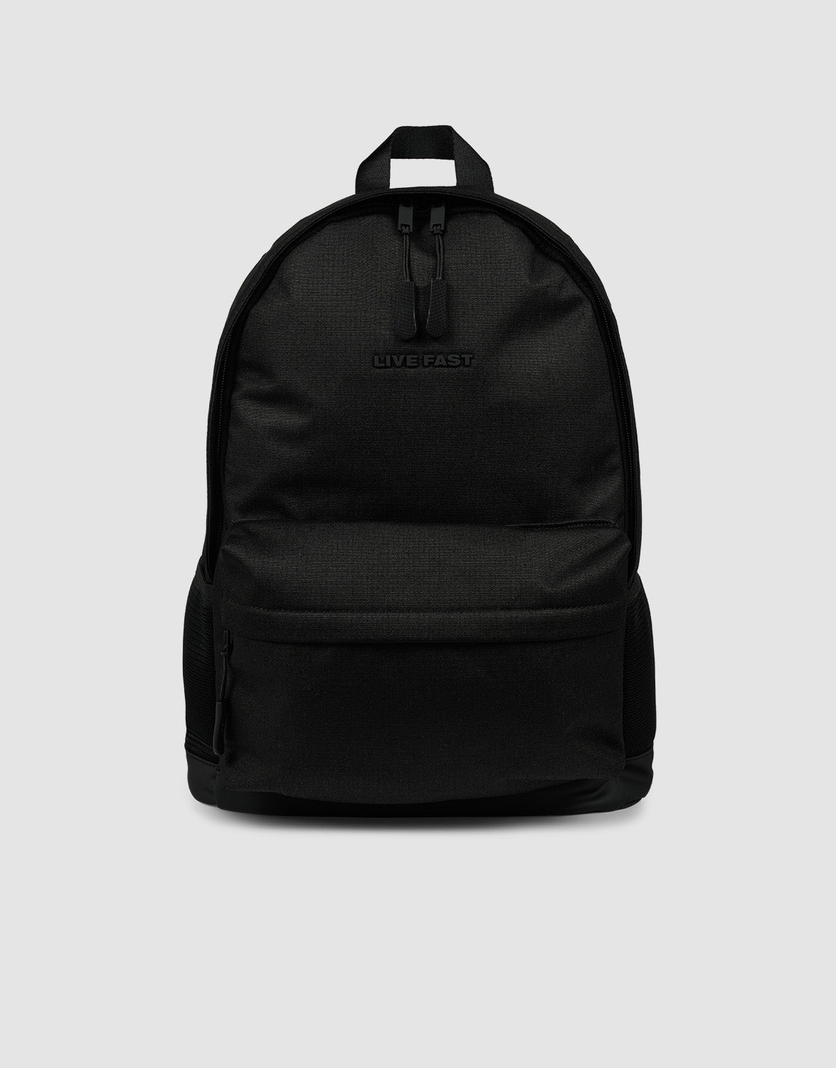 The LFDY Backpack by LIVE FAST DIE YOUNG is a plain black rucksack (19L) with a front zip pocket, small top handle, embossed "LIVEFAST" logo, and verstellbare Schultergurte, shown on a light gray background.| plain 