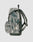 A side view of the LFDY Travel Backpack by LIVE FAST DIE YOUNG—a 25L laptop rucksack in green-gray camo, featuring adjustable shoulder straps, a zippered front pocket, and a top carry handle.