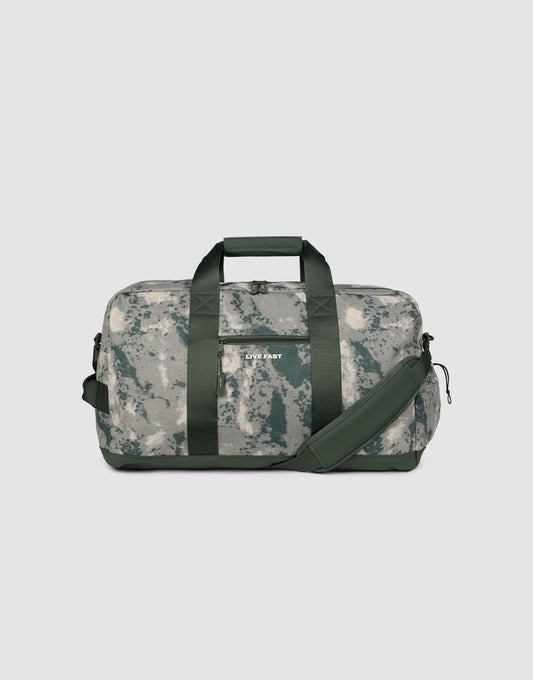 The LFDY Weekender 60 is a 43L sports bag with a gray and green camo design, dark green handles, an adjustable shoulder strap, and a front pocket featuring the LIVE FAST DIE YOUNG logo.| plain 