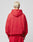 A person with short bleached blonde hair is shown from behind, wearing a LIVE FAST DIE YOUNG LFDY IV Ever Hooded oversize red sweatshirt and matching 100% Baumwolle red pants against a plain light gray background.