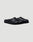 The LFDY Mules by LIVE FAST DIE YOUNG are black slip-on clogs with closed toes, textured PU Sohle, and schwarze Innenmaterial, shown on a plain light gray background.