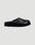 The LFDY Mules by LIVE FAST DIE YOUNG are black slip-on mule shoes with a rounded toe, flat back, thick ridged EVA sole, and schwarze Innenmaterial, shown against a plain light grey background.