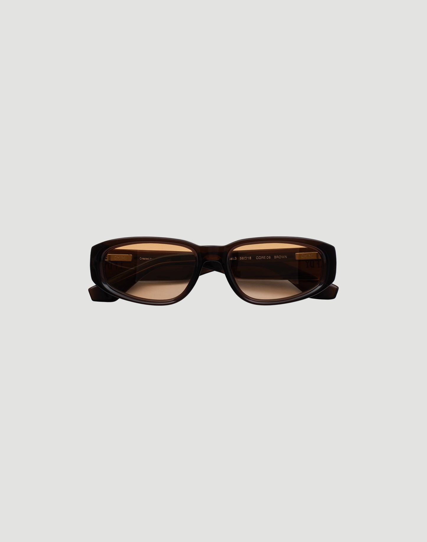 LIVE FAST DIE YOUNGs LFDY x Chimi Shades 09 feature rectangular dark brown acetate frames and CR39 lenses with reliable UV protection, showcased against a plain light gray background.| plain 