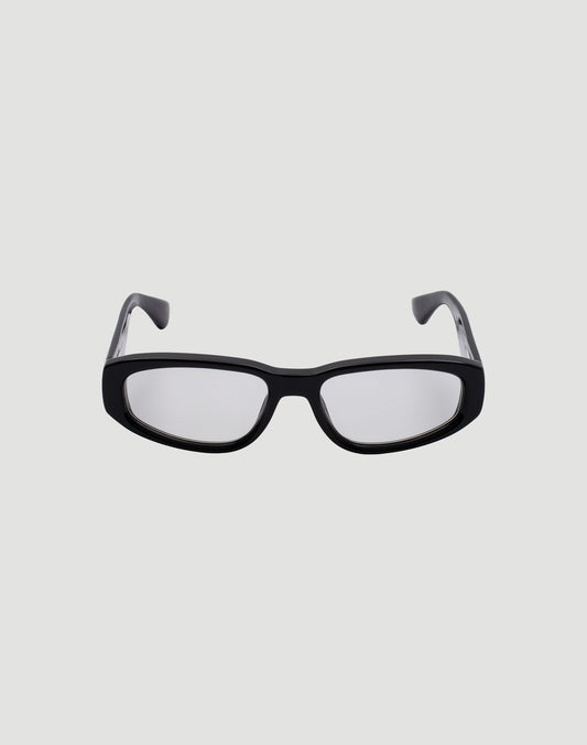 Front view of LIVE FAST DIE YOUNG LFDY x Chimi Shades 09, black rectangular frame with clear photochromic lenses offering UV protection, displayed on a plain light gray background.