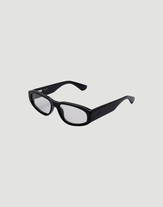 A pair of LFDY x Chimi Shades 09 by LIVE FAST DIE YOUNG, black rectangular eyeglasses with clear lenses and glossy finish, featuring a modern chunky design and reliable UV protection, displayed on a light gray background.