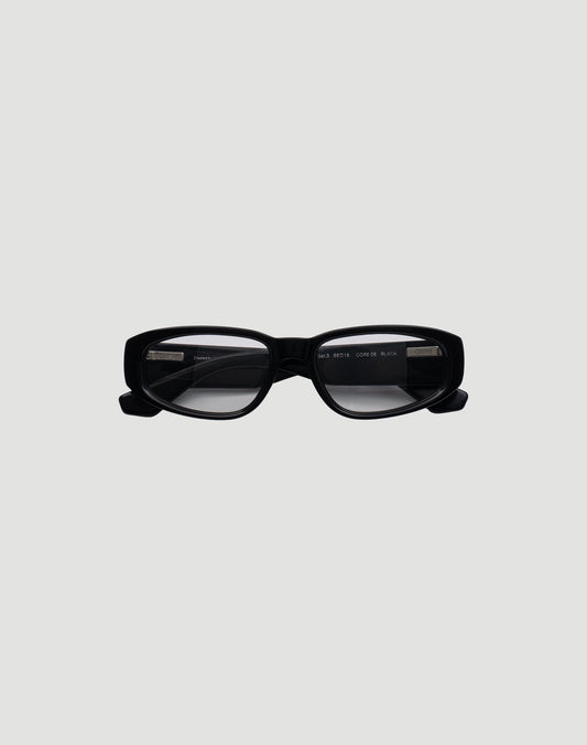The LFDY x Chimi Shades 09 by LIVE FAST DIE YOUNG feature rectangular black Acetat Brille frames and dark UV-protection lenses, showcased on a plain light gray background. 