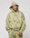 A man wears the LIVE FAST DIE YOUNG Camo Hooded Zip—a green and beige oversized camo-patterned hoodie—paired with matching pants, standing against a plain background and looking at the camera with a neutral expression.