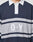 A person wearing the LFDY Striped Polo by LIVE FAST DIE YOUNG, featuring navy blue and gray stripes, a white collar, and D Y embroidered on the front. The image is cropped to display only the upper torso.
