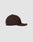The LFDY x NEW ERA 59FIFTY Low Profile by LIVE FAST DIE YOUNG is shown from the side with a flat brim and sticker, its dark brown color standing out against a plain light gray background.