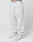 A person wears Basic Loose Jogger sweatpants by LIVE FAST DIE YOUNG, featuring a loose fit, light gray color, elastic waistband, and visible LIVIN branding. Theyre paired with white sneakers and posed against a plain white background.