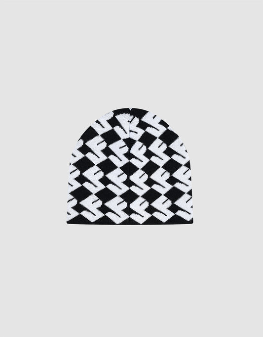 The LF Monogram Beanie by LIVE FAST DIE YOUNG is a black and white Polyacryl knit featuring a bold geometric zigzag Jacquard Monogram Muster pattern and subtle Flaglabel, shown on a plain light gray background.