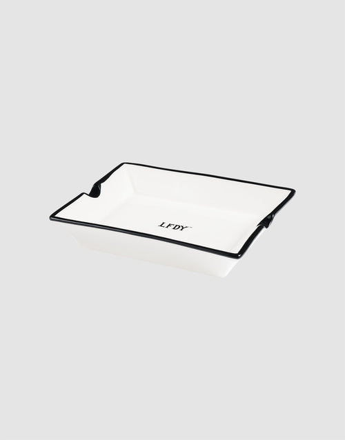 The LFDY Ashtray by LIVE FAST DIE YOUNG is a rectangular white porcelain ashtray with a black rim and central "LFDY" logo in black (Model LF2603-20136), shown on a light gray background.