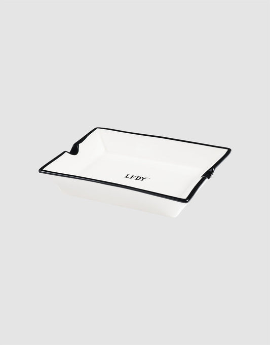 The LFDY Ashtray by LIVE FAST DIE YOUNG is a rectangular white porcelain ashtray with a black rim and central "LFDY" logo in black (Model LF2603-20136), shown on a light gray background.