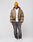 A man in the LFDY Winter Bomber Jacket by LIVE FAST DIE YOUNG, a white t-shirt, dark gray jeans, white sneakers, and an orange beanie stands against a plain light background, looking to his side with a neutral expression.