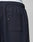 Close-up of the back pocket area of dark navy LFDY Striped Jogger sweatpants by LIVE FAST DIE YOUNG, featuring an elastic waistband and a small black HEY tag. The white waistband of underwear is slightly visible above the pants.