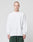A person with a shaved head wears the LIVE FAST DIE YOUNG Basic Script Waffle Longsleeve in white and dark green pants, standing against a light gray background with a neutral expression.