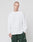A person with short hair wears the LIVE FAST DIE YOUNG Basic Script Waffle Longsleeve in plain white and dark green pants, standing against a light gray background and looking at the camera with a neutral expression.