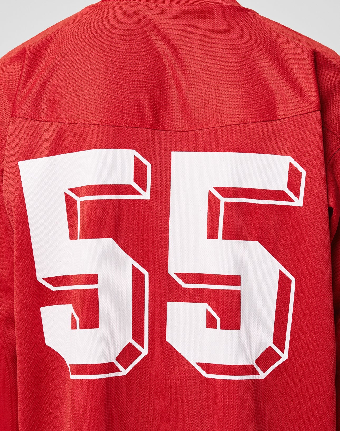 The LFDY Hockey Jersey by LIVE FAST DIE YOUNG is a red, oversized sports jersey with bold white block-style number 55 on the back, crafted from durable polyester.