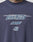The LFDY Triple Racing Tee by LIVE FAST DIE YOUNG is a navy oversize t-shirt with “LIVE FAST” in stylized white and blue, LF and 40 below, plus multilogo frontprint. Made of 100% cotton. A tattooed neck appears at the image top.