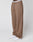 A person wears the LIVE FAST DIE YOUNG Live Fast Boucle Pants in loose-fitting brown knit with an elastic waistband and straight leg, paired with white sneakers and a visible "LIVE FAST" waistband, against a plain white background.