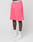 A person wears LIVE FAST DIE YOUNG Basic Shorts in bright pink with an elastic waistband, white socks with “LEDY” text, and white Nike sneakers. Only the lower half of their body is visible against a plain white background.