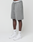 A person wears LIVE FAST DIE YOUNG Basic Shorts in gray with a branded waistband, white LEDY logo socks, and white sneakers. Only the lower half of the regular fit look is shown against a plain white background.