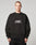 A person with short hair wears the Fuck Die Young Sweater by LIVE FAST DIE YOUNG, an oversize black Baumwolle sweatshirt. Facing forward, they have a neutral expression against a plain light gray background.