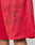 Close-up of LIVE FAST DIE YOUNG’s Live Fast IV Ever Shorts in red athletic mesh, oversized fit, elastic waistband, and LIVE FAST IV EVER faded black print. Polyester. Part of a person’s leg is visible at the bottom.