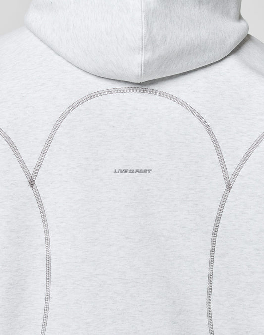 Back of the LFDY Active Fleece Hooded Zip by LIVE FAST DIE YOUNG in light gray, oversize fit with curved seams, soft Baumwolle. Features a subtle logo and LIVE 2 FAST text at the center.