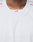 Close-up of a person wearing the Basic Mesh Jersey by LIVE FAST DIE YOUNG. This white oversize-fit sports jersey is made from 100% polyester with a V-neck collar. Red LFDY letters are visible inside the collar; face not shown.