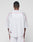 A person faces away from the camera, wearing the LIVE FAST DIE YOUNG Basic Mesh Jersey in white with red piping, a small geometric patch near the hem, V-neckline, and paired with matching white shorts.