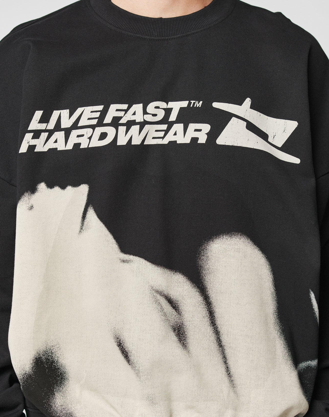 The LFDY Mystic Sweater by LIVE FAST DIE YOUNG is a black oversized sweatshirt with topstitching, LIVE FAST HARD WEAR text, and a bold white abstract reclining figure on the front, crafted from comfortable Baumwolle.