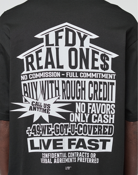 The LFDY Real Ones Tee by LIVE FAST DIE YOUNG is a black oversize-fit T-shirt made from 100% cotton, featuring bold white graphic front and back prints with phrases like REAL ONE$, BUY WITH ROUGH CREDIT, and LIVE FAST.
