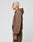 A person with short bleached blonde hair wears the LIVE FAST DIE YOUNG LFDY Lightweight Hooded Zip in brown and matching pants, Regular Fit, standing in profile against a plain light gray background.