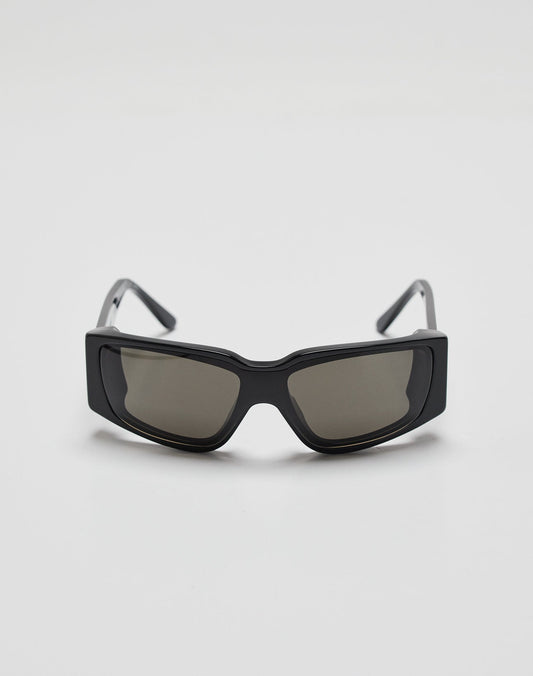 LIVE FAST DIE YOUNG’s Live Fast Curved Shades feature black rectangular frames crafted from thick Mazzuchelli Acetat and dark tinted lenses with 400 UV protection, shown against a plain white background.
