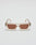 The Live Fast Sunglasses by LIVE FAST DIE YOUNG feature rectangular frames in transparent beige Mazzuchelli acetate, brown-tinted UV-protective lenses, and a subtle silver logo, shown on a plain white background.