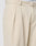 Close-up of beige Wide Chino trousers by LIVE FAST DIE YOUNG in 100% cotton, featuring a soft, slightly textured fabric, Doppel-Bundfalte waistband with belt loops, front pleats, and a side pocket.