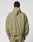 A person is seen from behind wearing the LIVE FAST DIE YOUNG Live Fast Trackjacket in light olive green nylon with elastic waist, visible stitched seams, and reflective pipings, set against a plain white background.