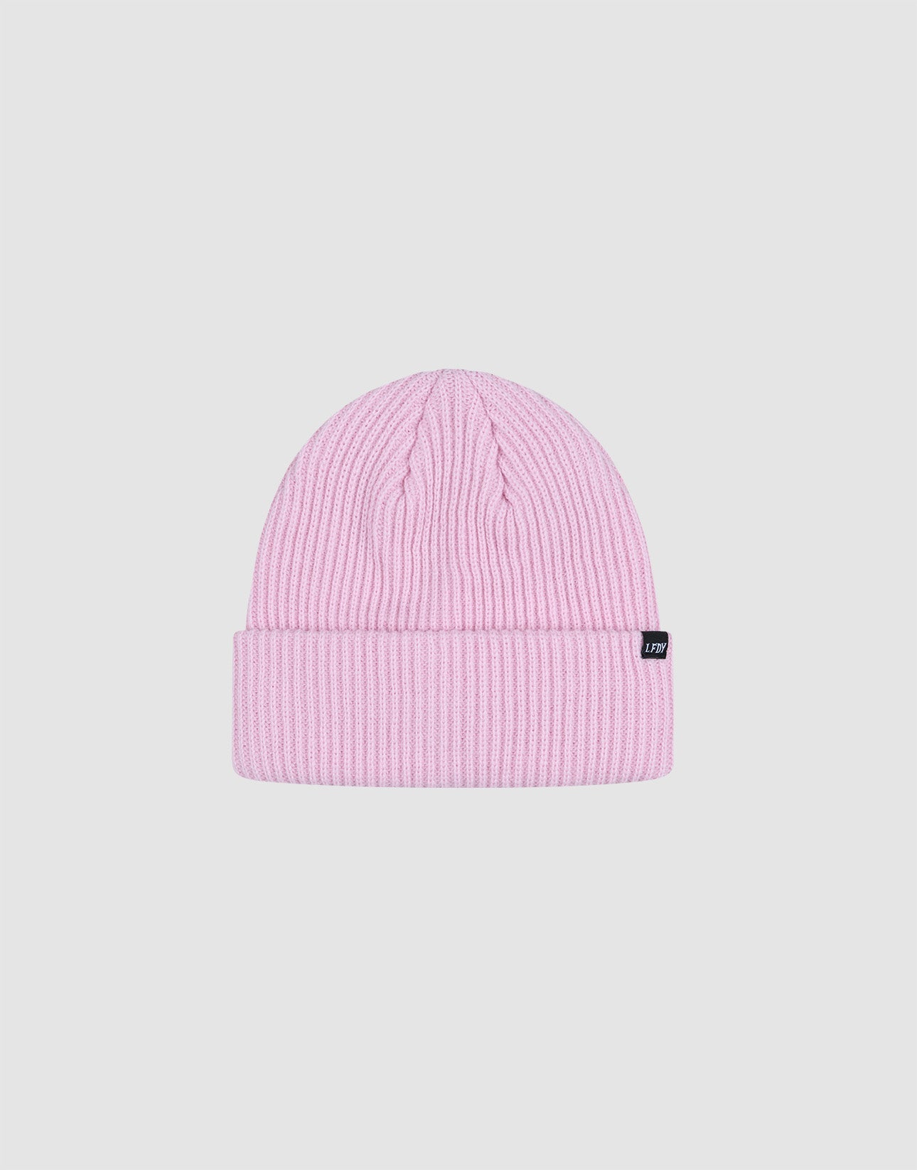 The LIVE FAST DIE YOUNG Double Rib Knit Beanie features a light pink ribbed polyamide design, folded cuff, and a small black side flag-label, shown against a plain white background.| plain